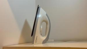 a telephone sitting on top of a shelf at RC Apartments Suriname in Paramaribo