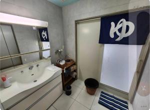 a bathroom with a tub and a sink and a shower at Takayama Fortune-inn in Takayama +52 photos