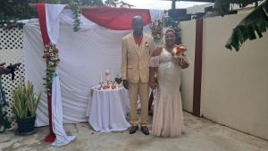 a man and a woman standing next to a table at Mango Dance in Scarborough