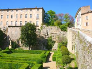 a garden in front of a building at Les Dourets in Saint Antonin du Var