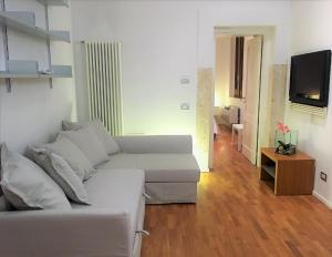 A television and/or entertainment centre at Navona Secret Suite