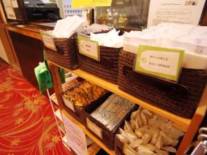 a display of wicker baskets on a shelf in a store at Hotel Sankyu in Tsukuba