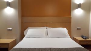 Letto o letti in una camera di Espel
