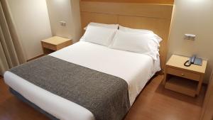 Letto o letti in una camera di Espel
