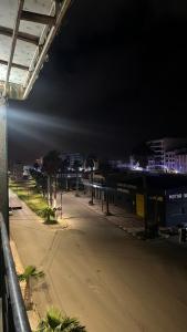an empty street in a city at night at Nador in Nador