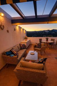 a living room with a couch and chairs and a table at Casanova 20G Calpe - Ifach Holiday Homes in Calpe