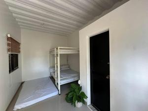 a room with a shelf in a room with a ceiling at MGS viewdeck resort in Samal