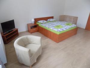 Postel nebo postele na pokoji v ubytování Agropenzion U Bartousku