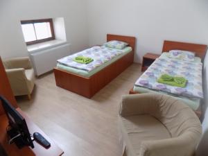 Postel nebo postele na pokoji v ubytování Agropenzion U Bartousku