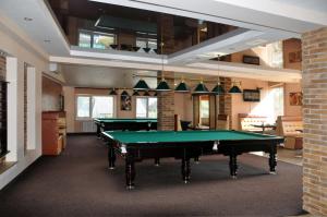 a billiard room with a pool table in it at Fortuna in Uzhhorod