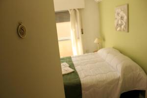 Mon Petit Hotel客房内的一张或多张床位