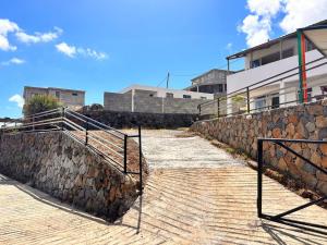 a set of stairs leading up to a building at EcoDream Lodge in Abercrombie +2 photos