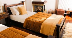 Postel nebo postele na pokoji v ubytování Archontiko Xantha