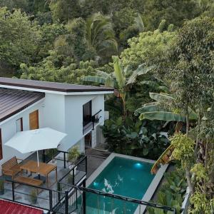 a view of a house with a swimming pool at Balay nimo by Sachzna in Amadeo
