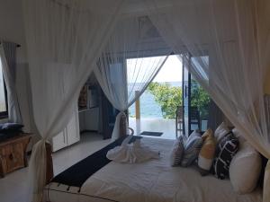 Un pat sau paturi într-o cameră la Nalini Resort +178 fotografii