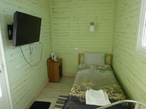 Кровать или кровати в номере Бутик-отель «Островский причал» 