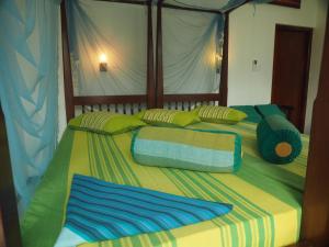 Letto o letti in una camera di Main Reef Guest House