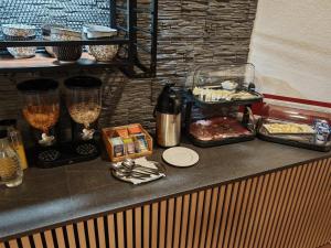 a counter with some food on top of it at Landhaus am Brubbel in Wallenborn