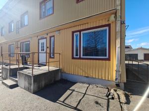 a building with a door and a window on it at As 8 Viima inc Sauna in Valkeakoski