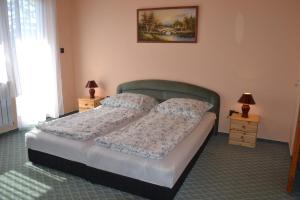 Ліжко або ліжка в номері Apartment Siofok, Somogy 19