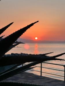 a view of the sunset from the deck of a ship at Casa Martina in Cogoleto