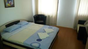 Postel nebo postele na pokoji v ubytování Alexander Flora Apartment + 4 fotografie