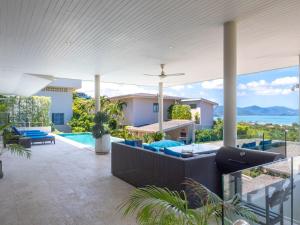 a villa with a view of the ocean at Luxe 4BR Sunset Seaview Villa Private Infinity in Plai Laem