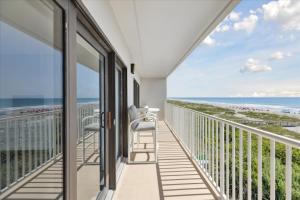 a balcony with a view of the beach at Boardwalk 401 in Cocoa Beach