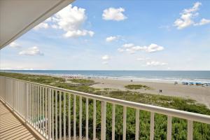 a view from the balcony of the beach at Boardwalk 401 in Cocoa Beach +36 photos