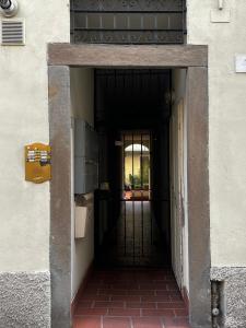 an entrance to a building with a black door at P4 Crema Home in Crema