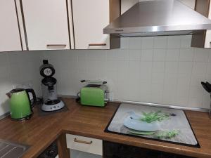 a kitchen with a counter top with a bowl on it at Ferienwohnung „Prims“ in Wadern +4 photos