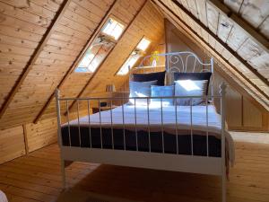 a bedroom with a bed in a attic at Zum Schafstall in Hünxe