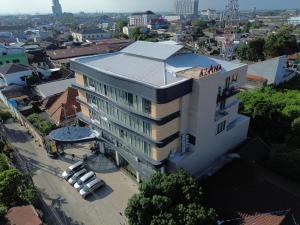 an overhead view of a building in a city at Azana Boutique Hotel Solo in Purwosari