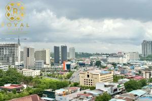a cityscape of a city with tall buildings at Royal Suites 2BR - Formosa Residence in Jodoh