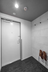 a room with two chairs and a sliding door at Gran Hills in Chitose +127 photos