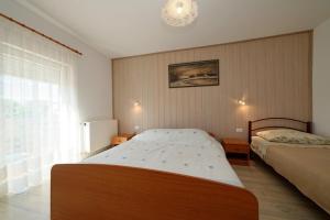 En eller flere senge i et værelse på Apartment Pula, Istria 3