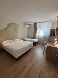 En eller flere senge i et værelse på M14 Hotel & Spa + 125 billeder