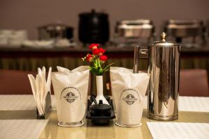 a table with three napkins and avelt at Verdant The Vintage in Lachung