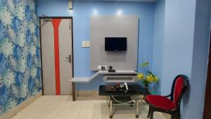 Televisor o centre d'entreteniment de Oracle Guest House