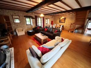 an overhead view of a living room with a white couch at Fontaine de Champagne in Champagne-et-Fontaine