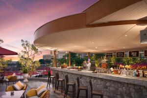 a bar on the roof of a building at Amari Pattaya in Pattaya