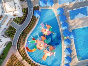 an overhead view of a swimming pool at a resort at Pickalbatros Palace Sharm "Aqua Park"- All inclusive in Sharm El Sheikh