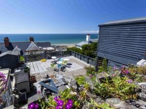 an aerial view of a patio with a view of the ocean at 2 Bed in Woolacombe oc-76350 in Woolacombe