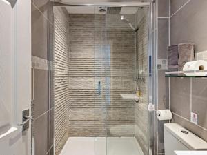 a shower with a glass door in a bathroom at 2 Bed in Aberdyfi oc-dy044 in Aberdyfi +12 photos
