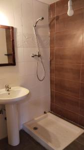 a bathroom with a shower and a sink at El Rincón del Olivo in Cartagena +20 photos