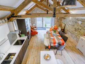 a kitchen and living room with a table in a room at 2 Bed in Cowbridge oc-88000 in Llandow