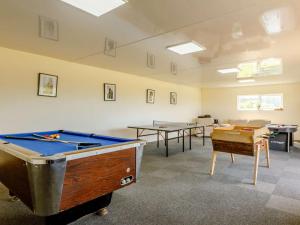 a room with pool tables and ping pong tables at 2 Bed in Ilfracombe oc-rugga in Berrynarbor