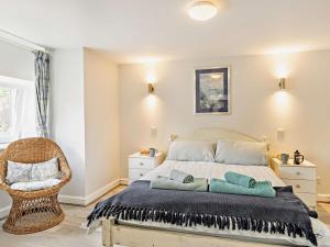 a bedroom with a bed with two pillows on it at 1 Bed in Llangollen oc-92336 in Llangollen