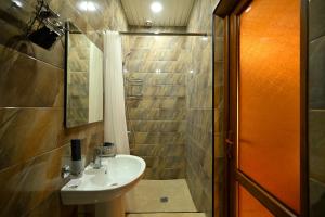 a bathroom with a sink and a shower at Areni Wine Art in Areni +36 photos