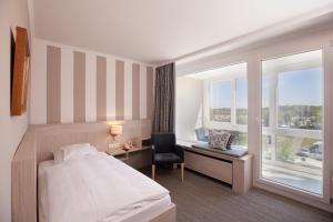 เตียงในห้องที่ Hotel Seelust